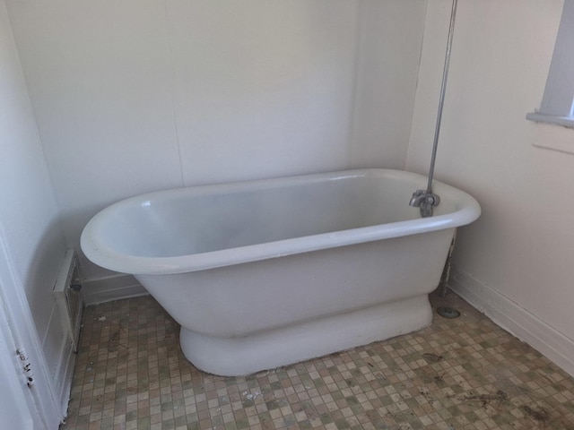 bathroom with a washtub