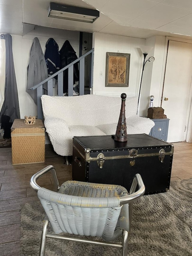 living room featuring dark wood-type flooring