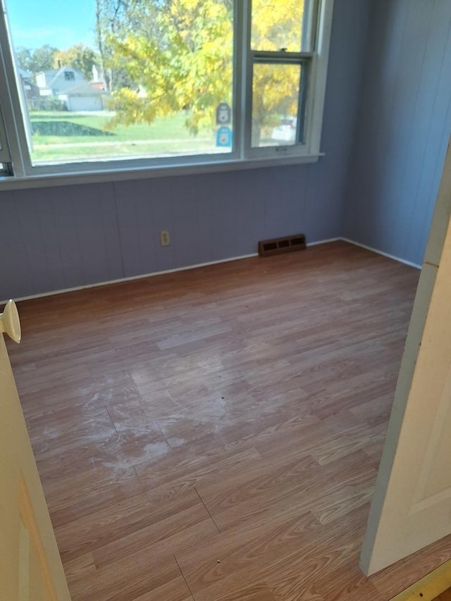 empty room with light wood-type flooring