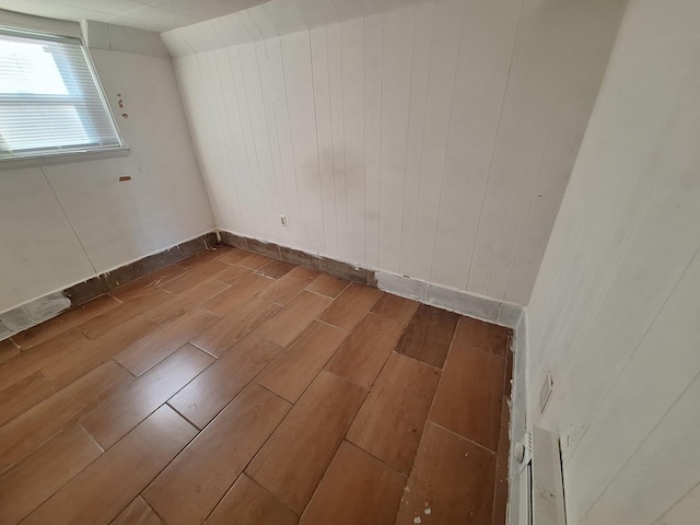 unfurnished room featuring wood-type flooring