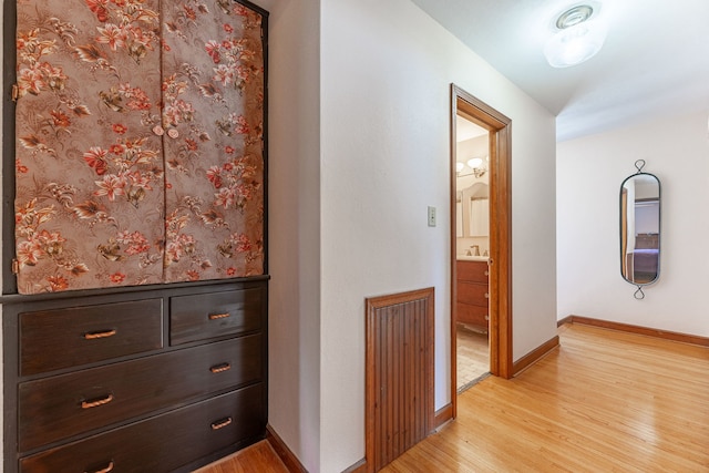 hallway featuring light wood-type flooring