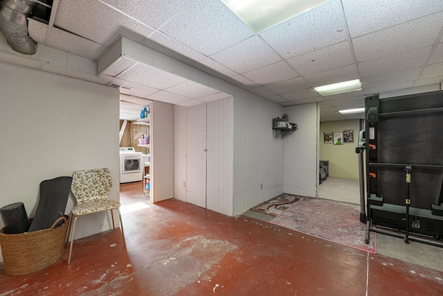 basement with washer / dryer and a drop ceiling