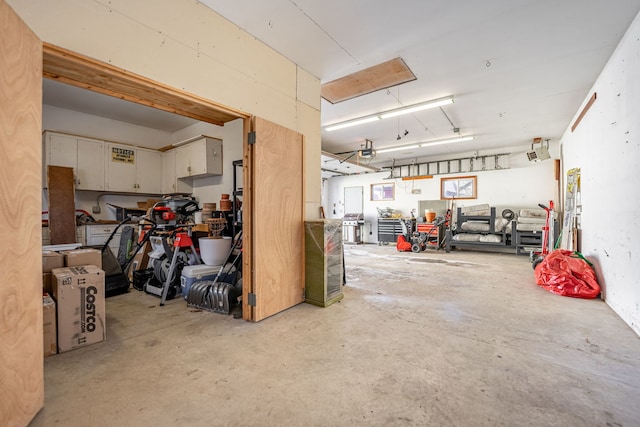 garage featuring a garage door opener