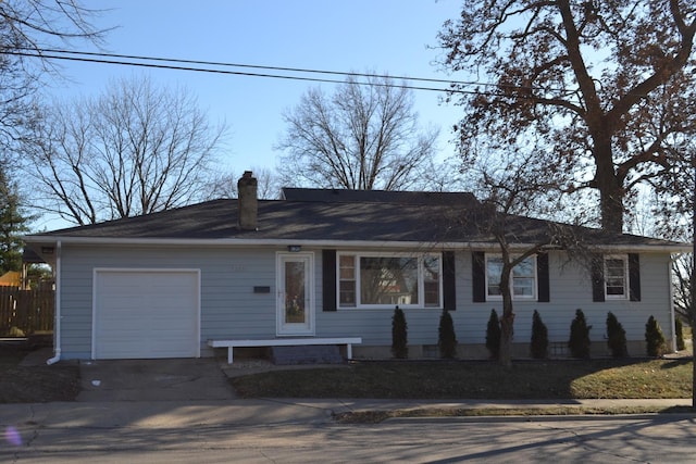 single story home with a garage