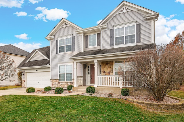 craftsman house with a porch, a garage, and a front lawn