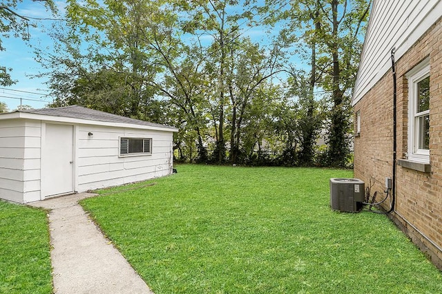 view of yard featuring central air condition unit