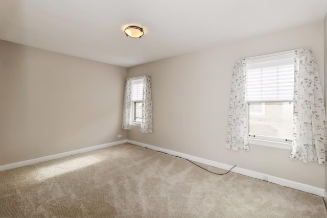 empty room featuring carpet floors