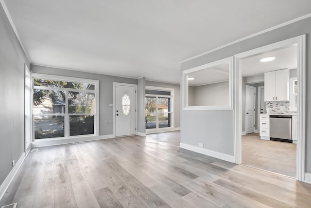 interior space featuring a wealth of natural light and light hardwood / wood-style flooring