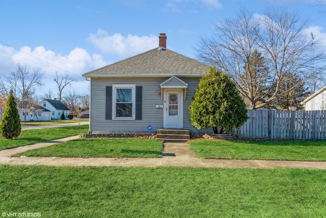 bungalow with a front yard