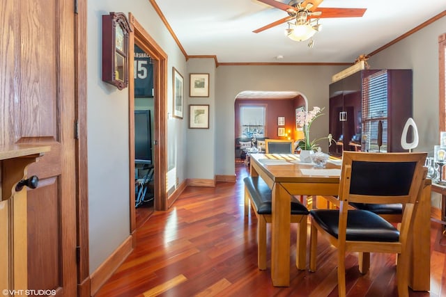 dining area featuring dark hardwood / wood-style floors, ceiling fan, and ornamental molding