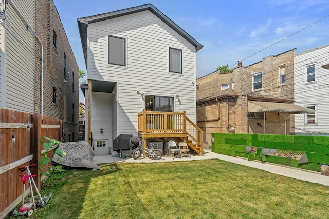 back of property featuring a patio area and a yard