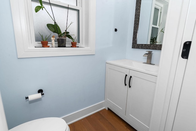 820 Exmoor Rd, Olympia Fields, IL 60461 - bathroom featuring vanity, wood finished floors, baseboards, and toilet
