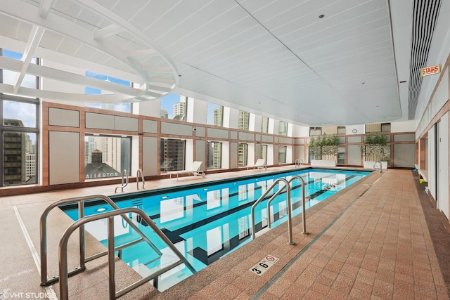 view of swimming pool with a patio area