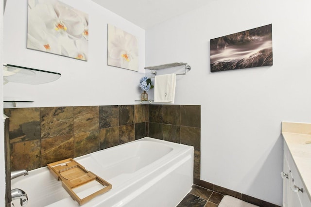 bathroom featuring a bathing tub and vanity