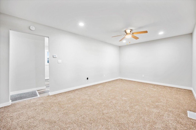 carpeted empty room with ceiling fan