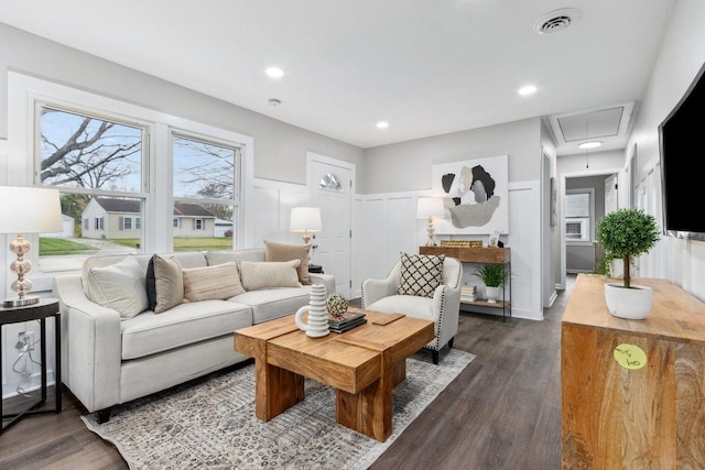 living room featuring dark hardwood / wood-style floors