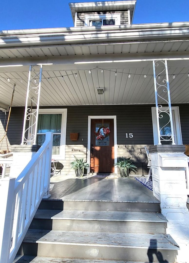 property entrance with a porch