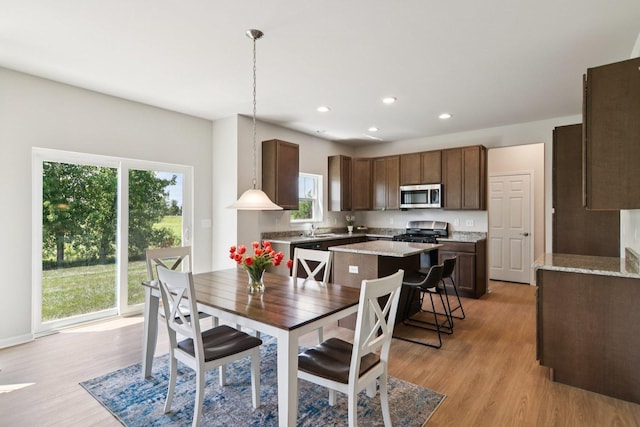 329 N Aspen Dr, Cortland, IL 60112 - dining space with light wood finished floors, plenty of natural light, and recessed lighting