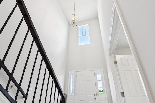 329 N Aspen Dr, Cortland, IL 60112 - entryway featuring stairway and a towering ceiling