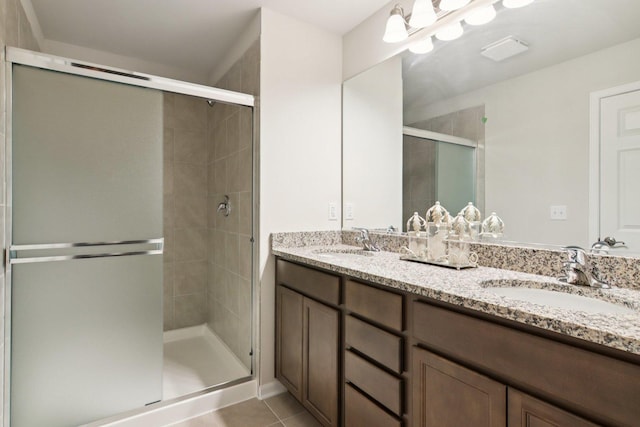 329 N Aspen Dr, Cortland, IL 60112 - full bath with double vanity, a shower stall, and tile patterned flooring