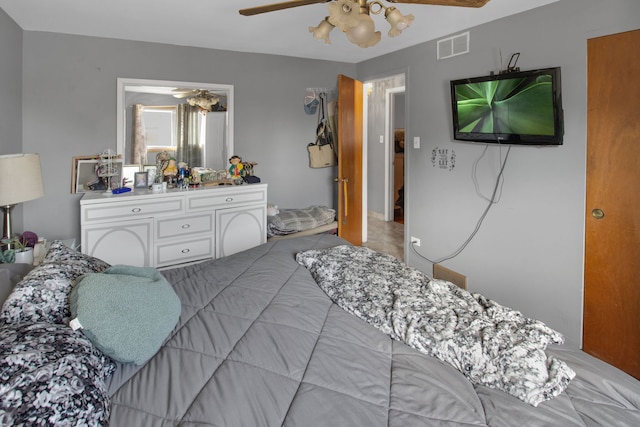 bedroom featuring ceiling fan