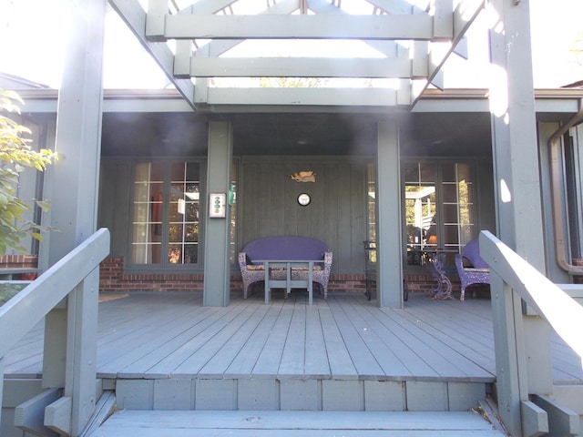 wooden terrace with a porch