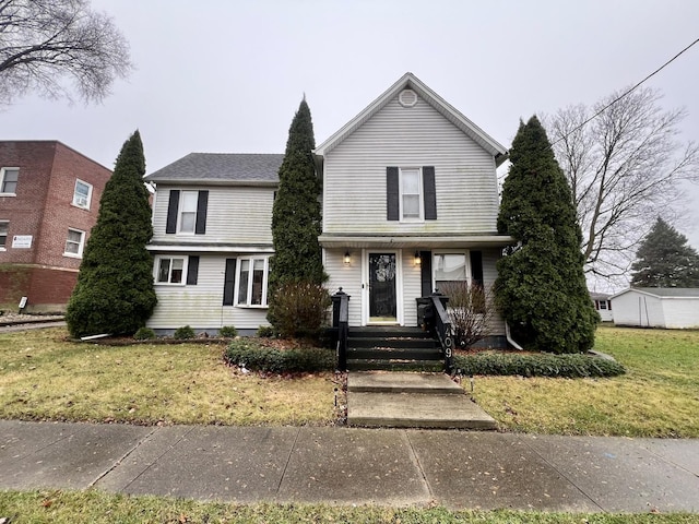 view of front of home featuring a front lawn