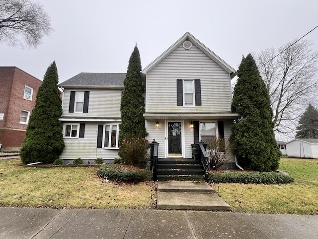 view of front property with a front lawn