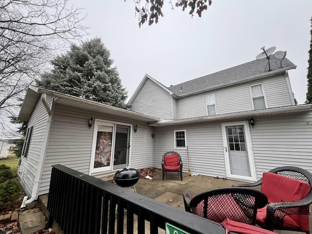 back of property with a patio area