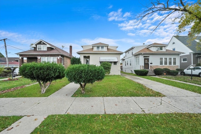 bungalow with a front lawn