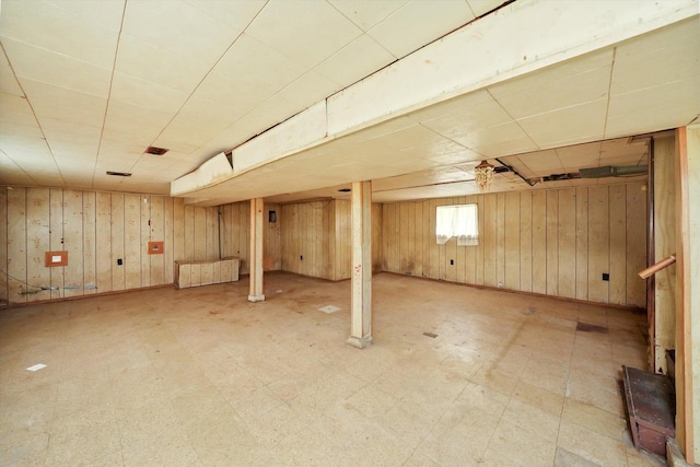 basement with wood walls