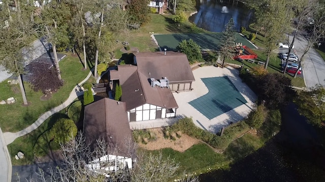 drone / aerial view with a water view