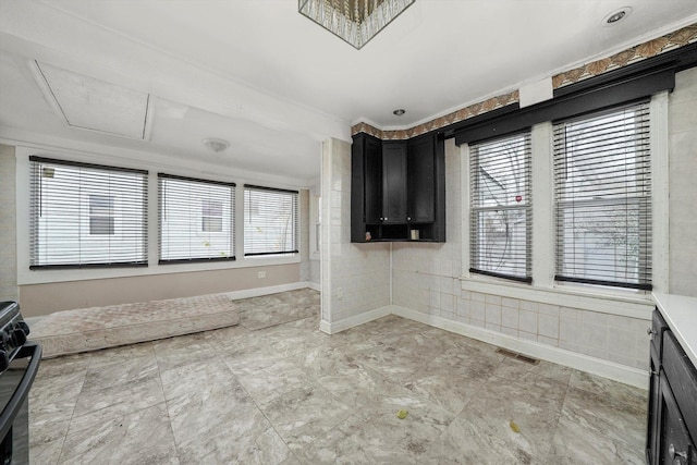 interior space with crown molding