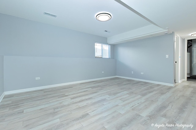 empty room featuring light hardwood / wood-style floors