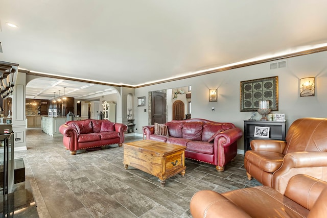 5N259 Wilton Croft Rd, Saint Charles, IL 60175 - living room featuring arched walkways, decorative columns, and baseboards