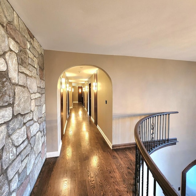 5N259 Wilton Croft Rd, Saint Charles, IL 60175 - hallway with arched walkways, wood finished floors, and an upstairs landing