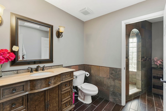5N259 Wilton Croft Rd, Saint Charles, IL 60175 - full bathroom with tile walls, wainscoting, toilet, vanity, and wood finished floors