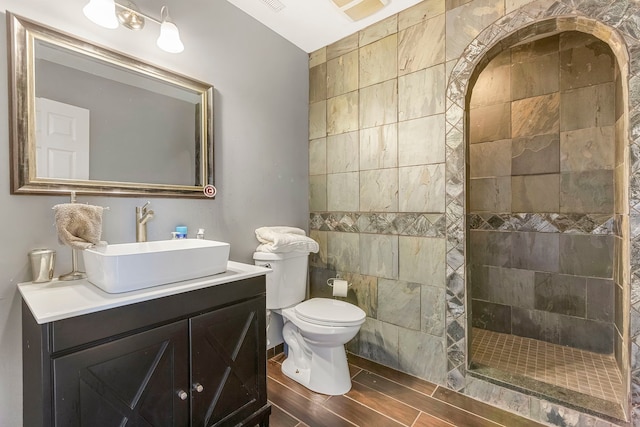 5N259 Wilton Croft Rd, Saint Charles, IL 60175 - bathroom with vanity, wood tiled floors, walk in shower, toilet, and tile walls