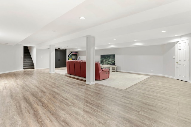 unfurnished living room with light hardwood / wood-style flooring