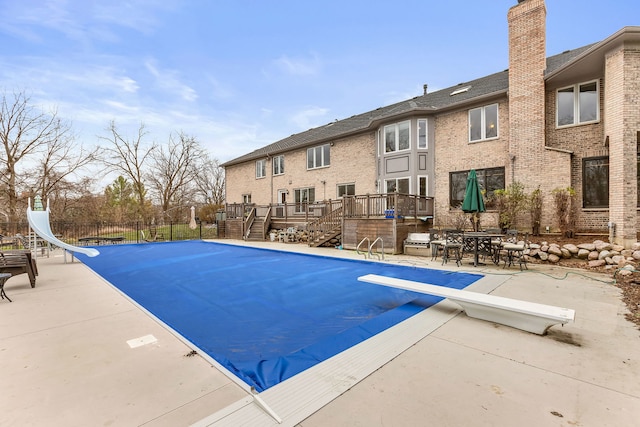 5N259 Wilton Croft Rd, Saint Charles, IL 60175 - view of pool featuring a deck, a water slide, stairs, and a patio