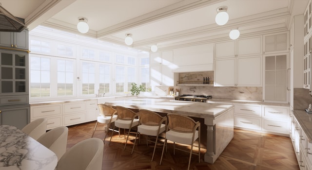 kitchen featuring backsplash, a kitchen island, parquet floors, and beam ceiling