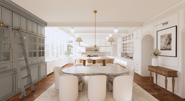 dining room featuring parquet floors and ornamental molding