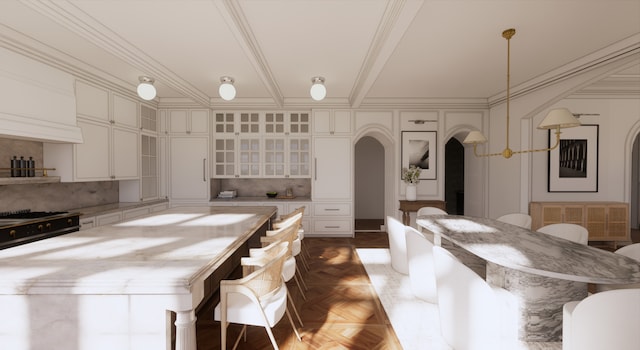 kitchen featuring tasteful backsplash, dark parquet floors, stainless steel stove, and a center island