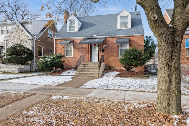 view of new england style home