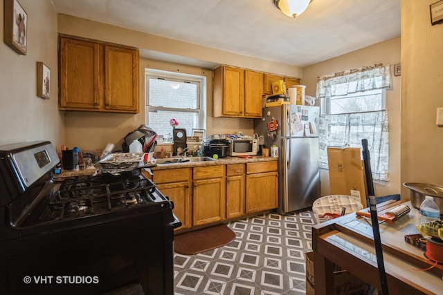 kitchen featuring sink and appliances with stainless steel finishes