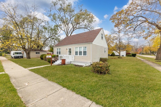 view of front of property with a front lawn