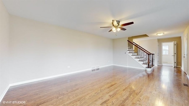 interior space featuring hardwood / wood-style floors and ceiling fan