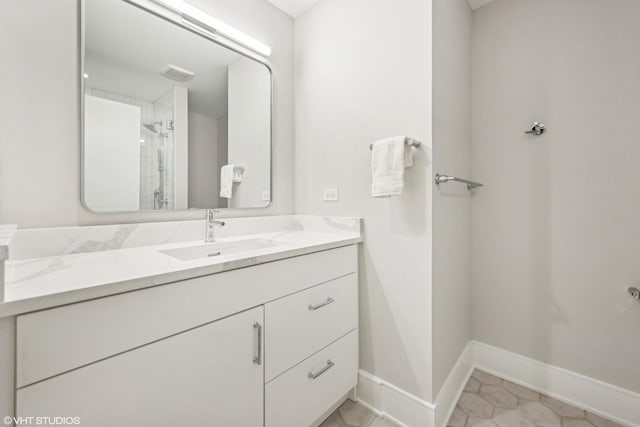 full bath with baseboards, visible vents, tile patterned flooring, an enclosed shower, and vanity