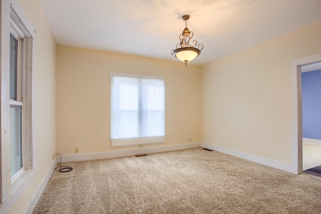 unfurnished room with carpet