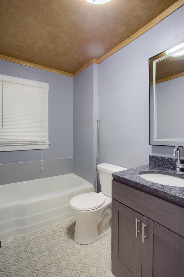 bathroom featuring vanity, toilet, and crown molding